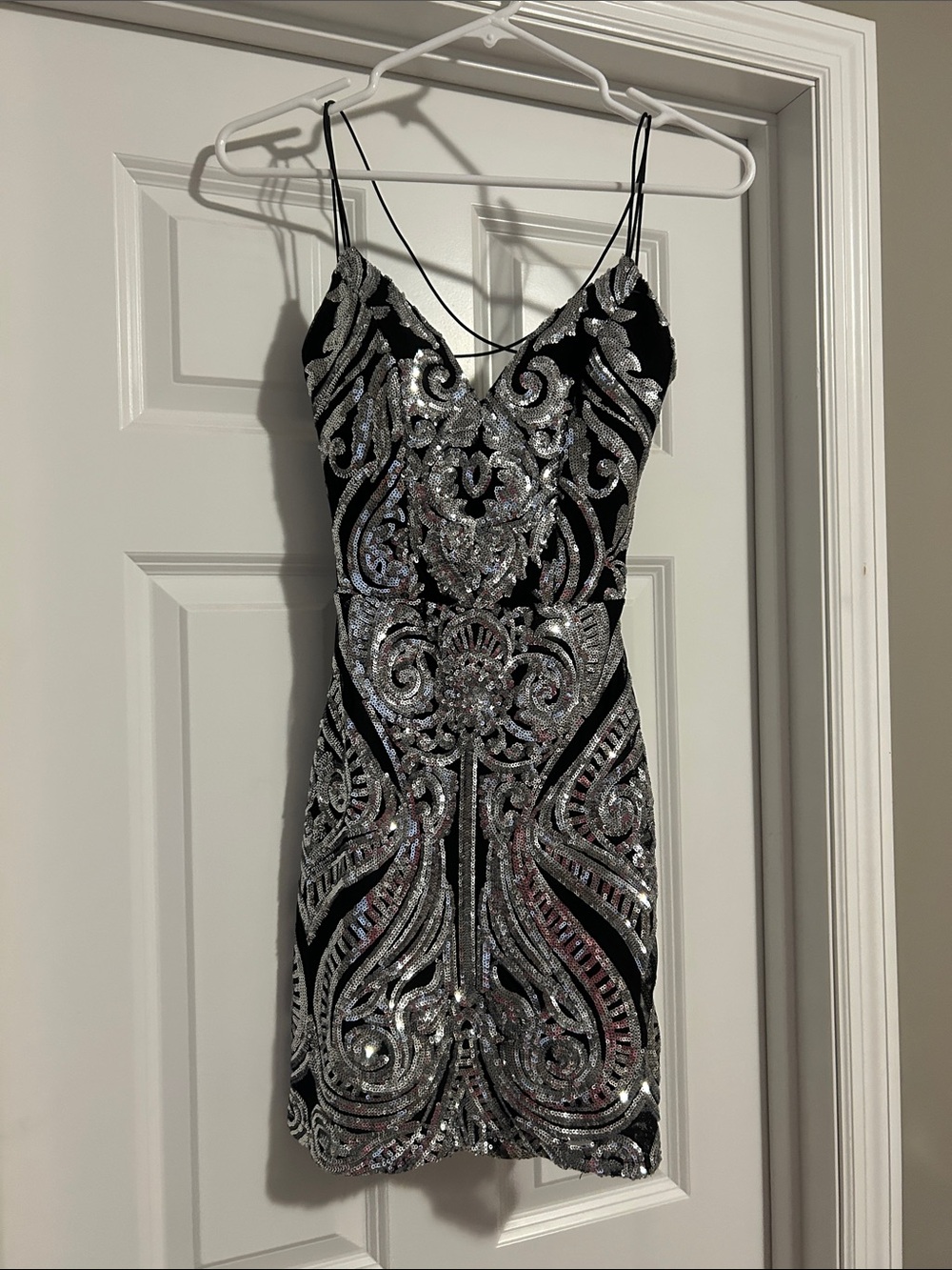 B. Smart Black Mini Dress with Silver Sequin Embellishment